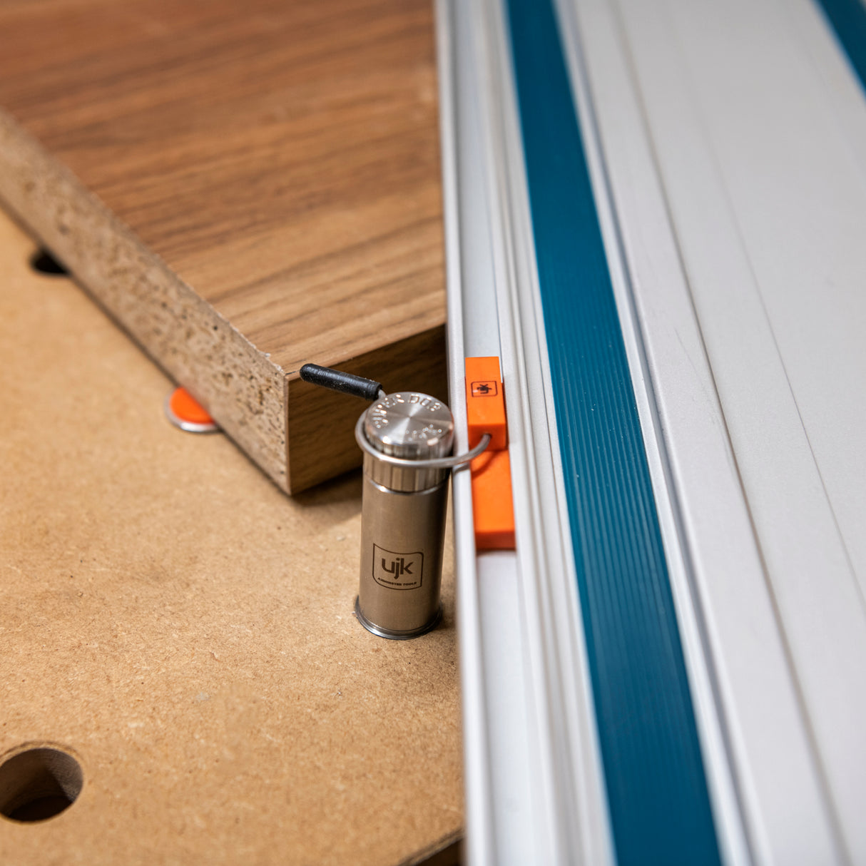 UJK Dog Rail Clip Pack of 2 in use with 20mm Bench Dogs on woodworking table