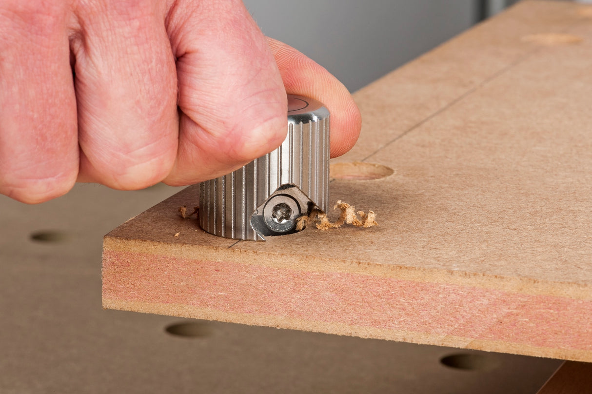 UJK Chamfer Tool with Solid Carbide Cutter creating precise chamfer around 20mm dog holes