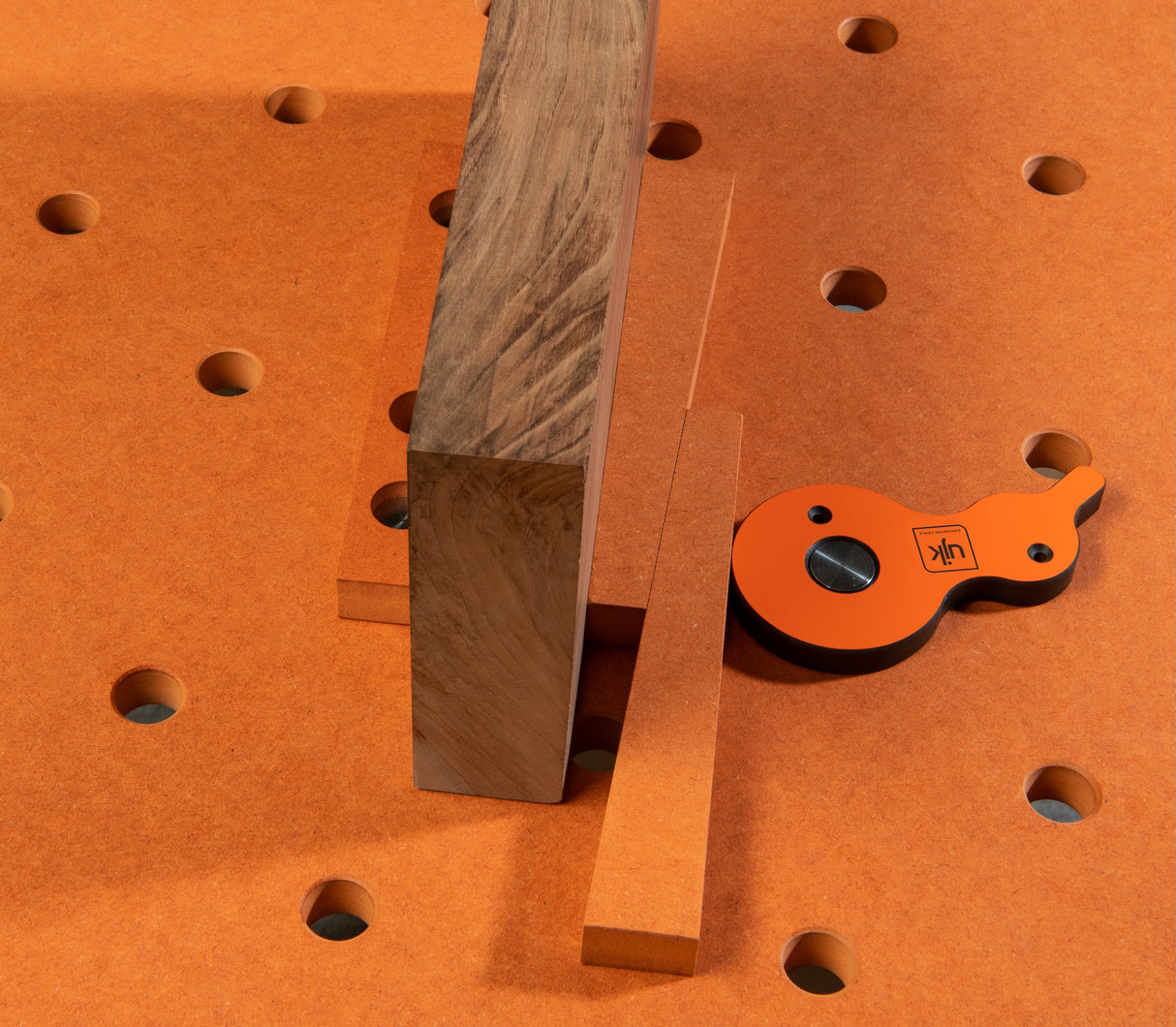 UJK Cam & Wedge Clamping Set in use on 20mm dog hole workbench - secure workpiece without hindrance