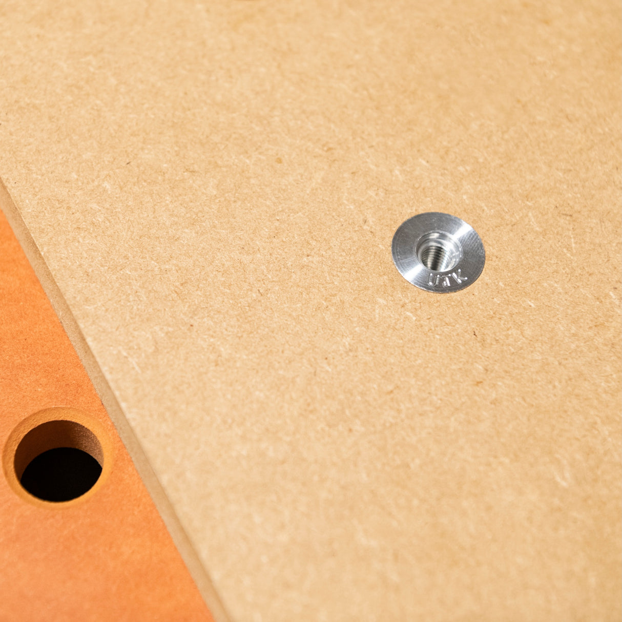 UJK 20mm Parf Long Anchor Bench Dogs in use on a workbench with thick top, providing precise fit in 20mm holes