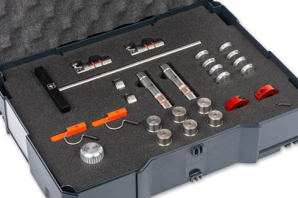 UJK Super Dog Accessory Kit in T-Loc Case, showcasing a selection of woodworking tools and accessories for dog hole workbenches