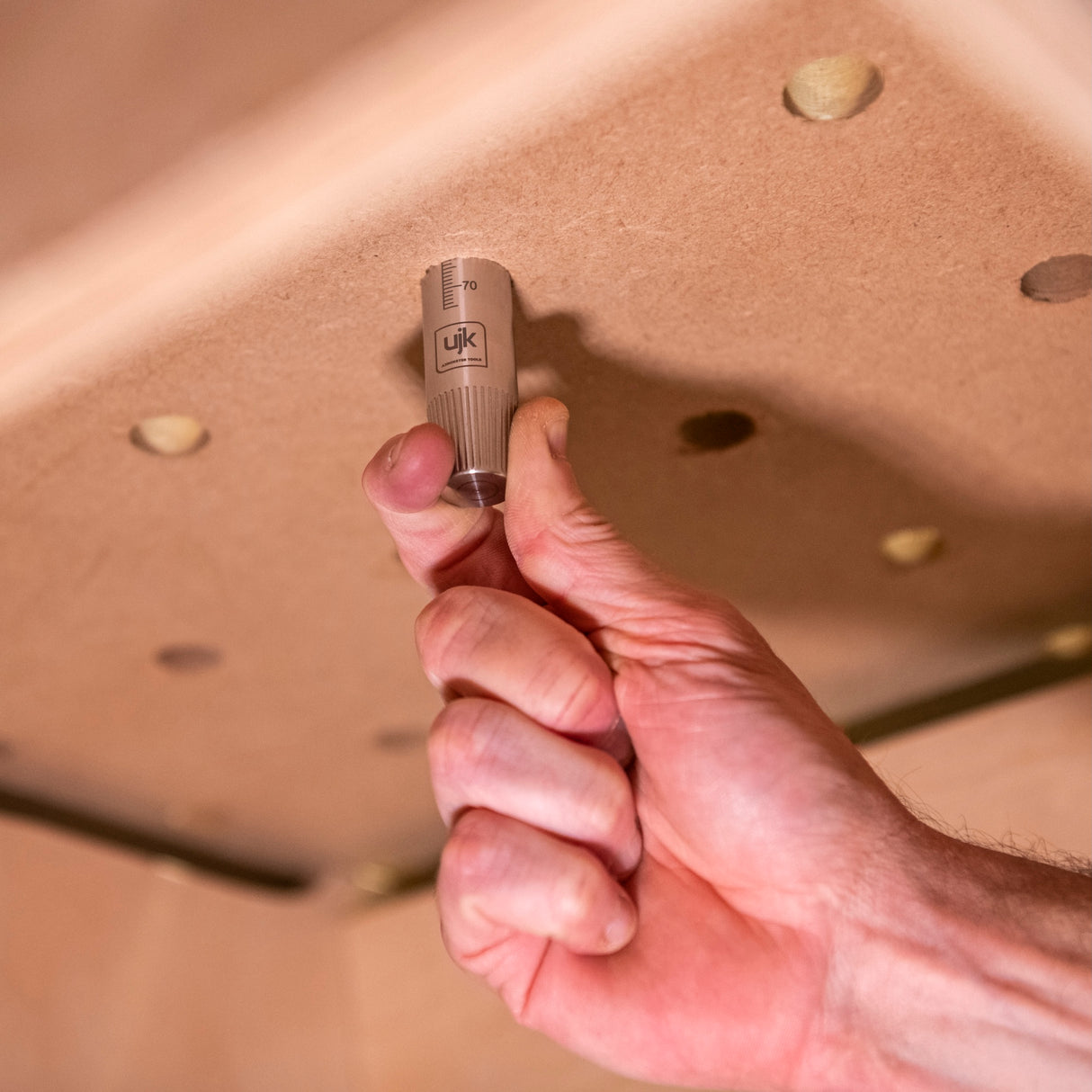 UJK 20mm Guide Rail Bench Dogs in use with Makita Guide Rails, hidden beneath rail for seamless woodworking setup