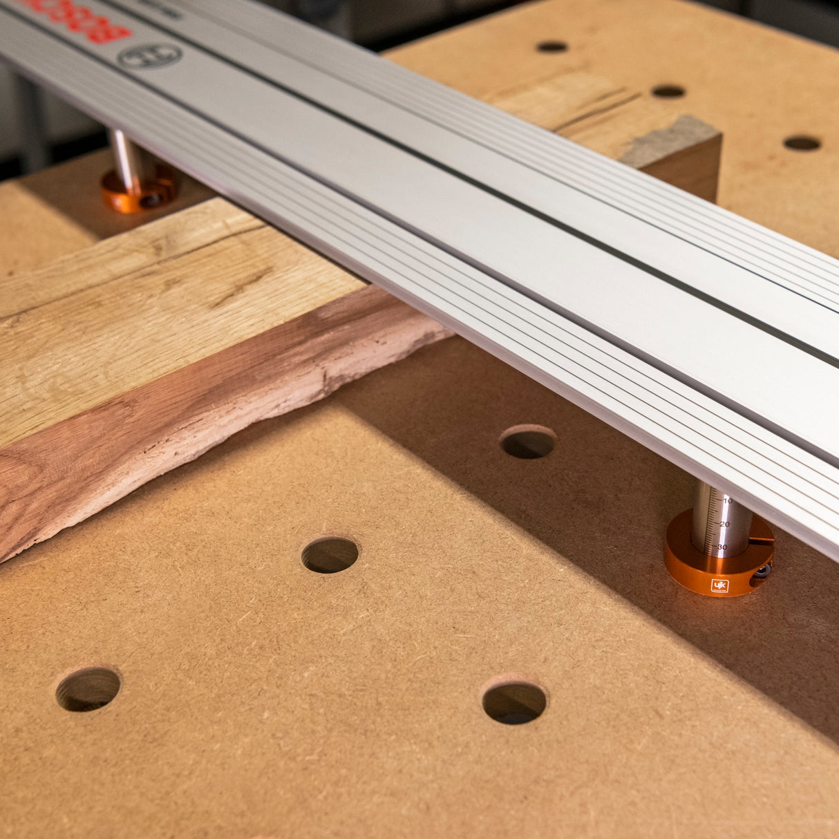 Stainless steel UJK 20mm Bench Dogs for Bosch and Mafell guide rails, Tee-bolt fitting in Tee-slot underside view