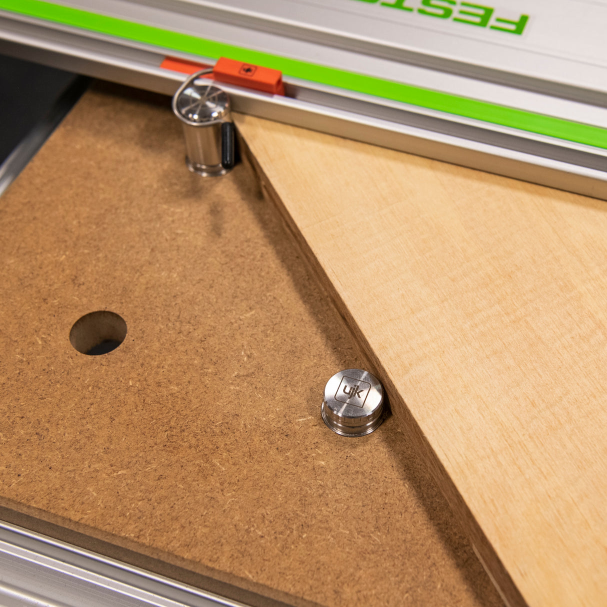 Two UJK Expanding 20mm Bench Dogs with 10mm projection in stainless steel, designed for precision woodworking in Australian workshops