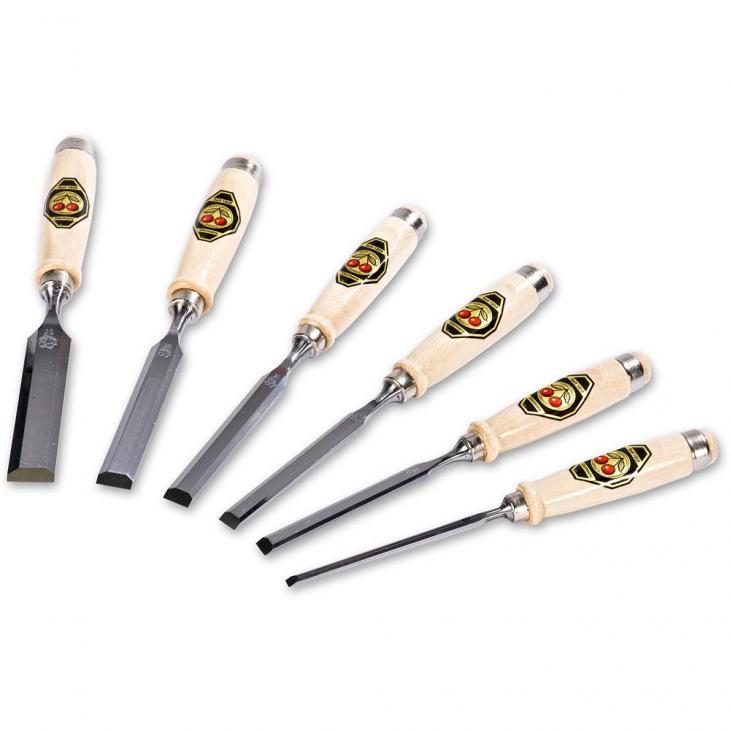 Set of six wooden-handled chisels on a white background