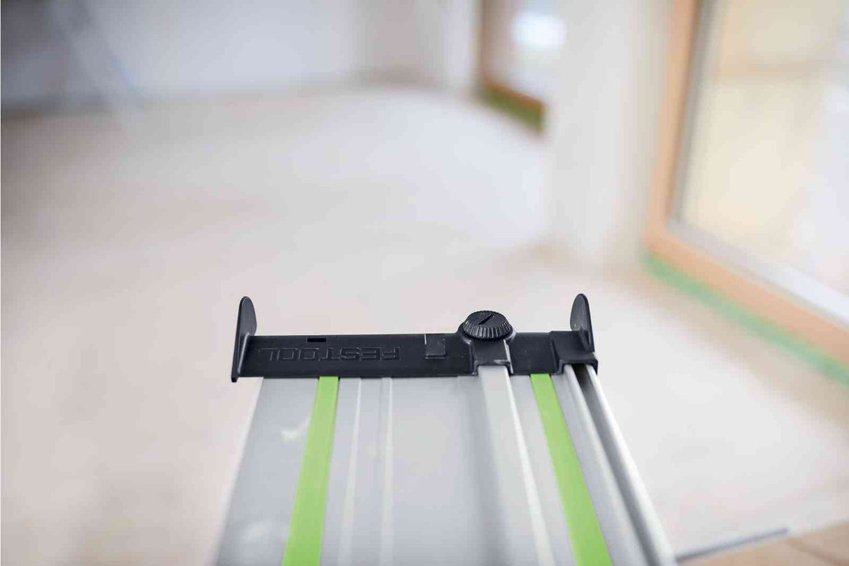 Festool FS Guide Rail Hose Guide Deflector attached to saw, prevents hose and cable tilting during use