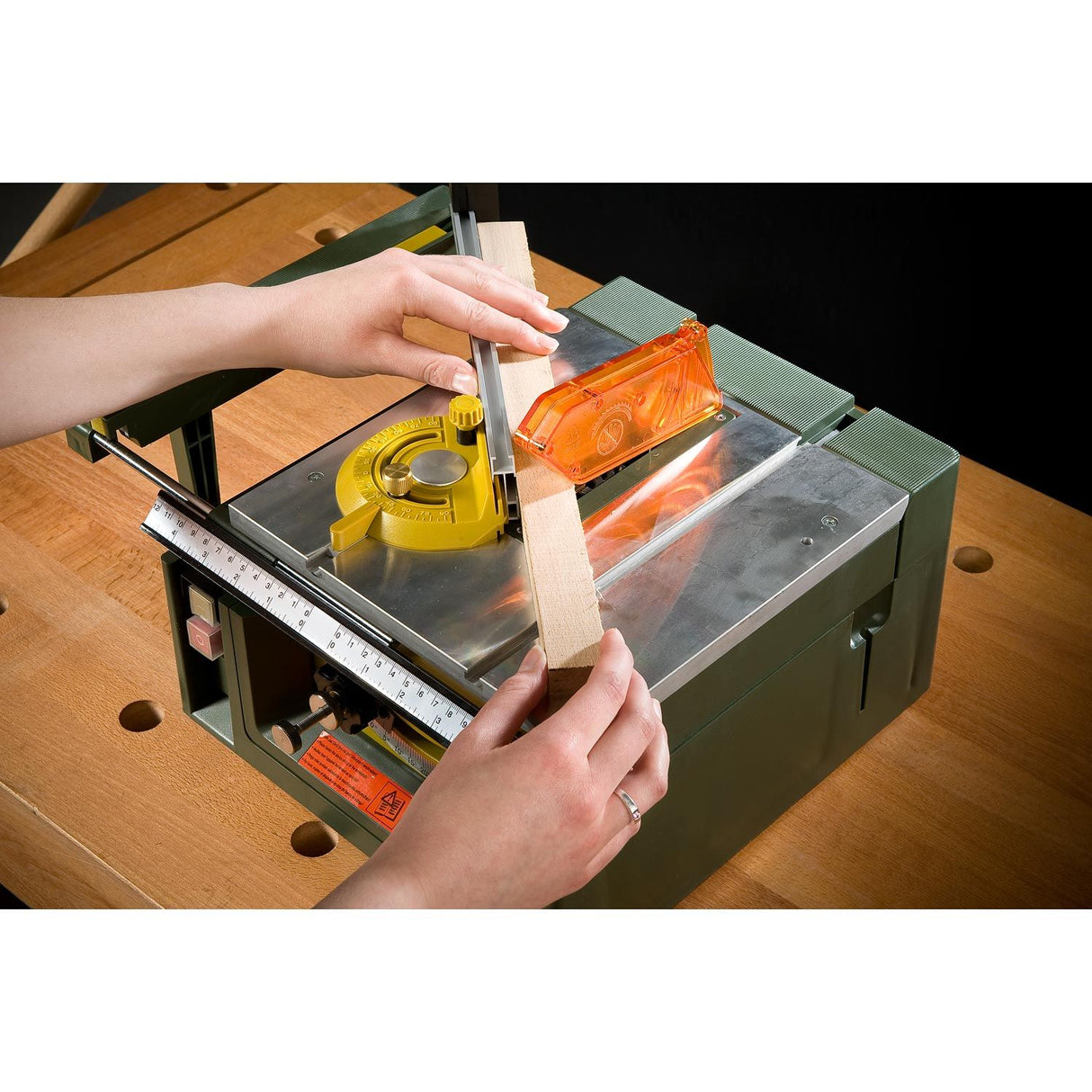 PROXXON FET Benchtop Table Saw cutting wood with precision