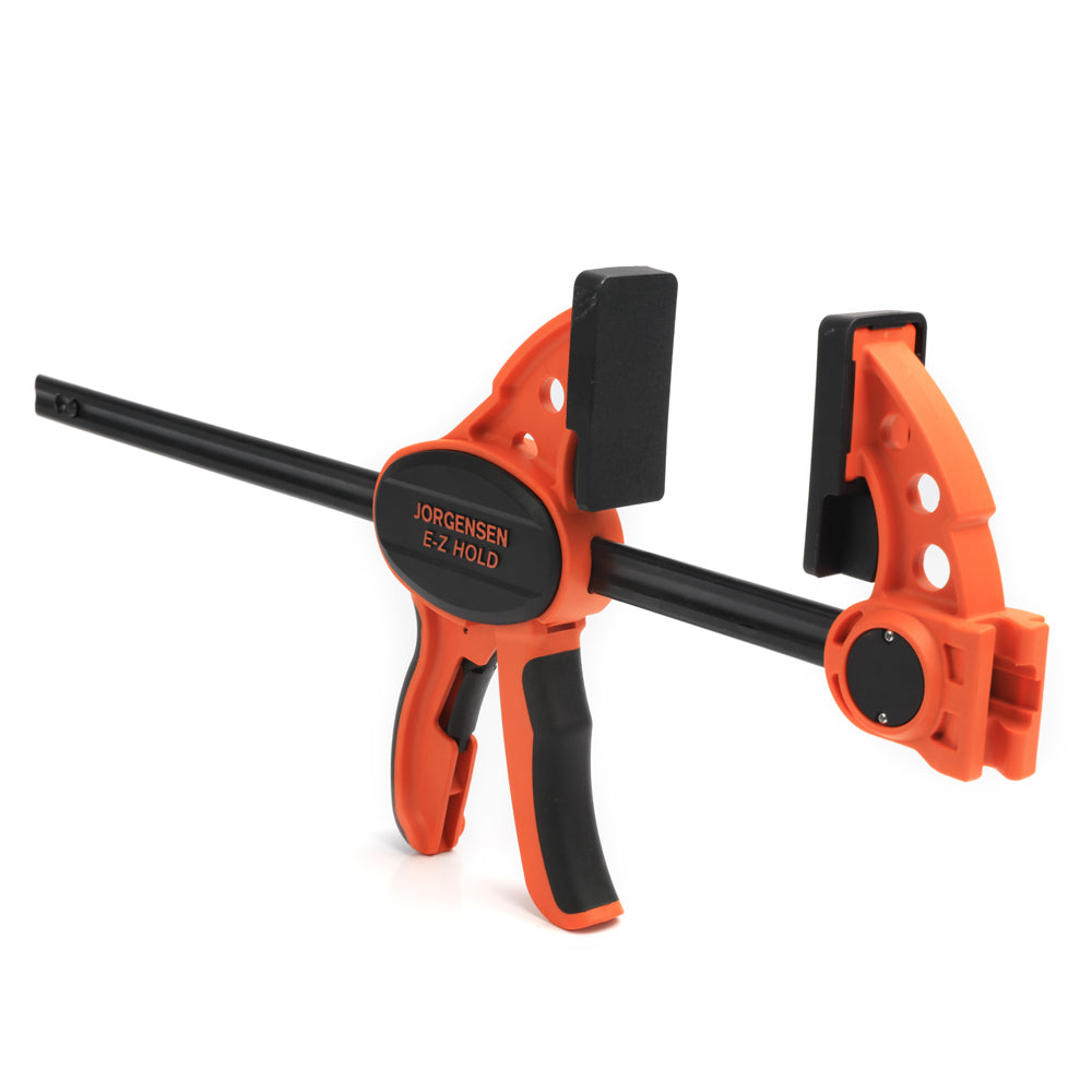 Pony Jorgensen E-Z HOLD Trigger Clamps in use, showing easy one-handed operation and protective pads