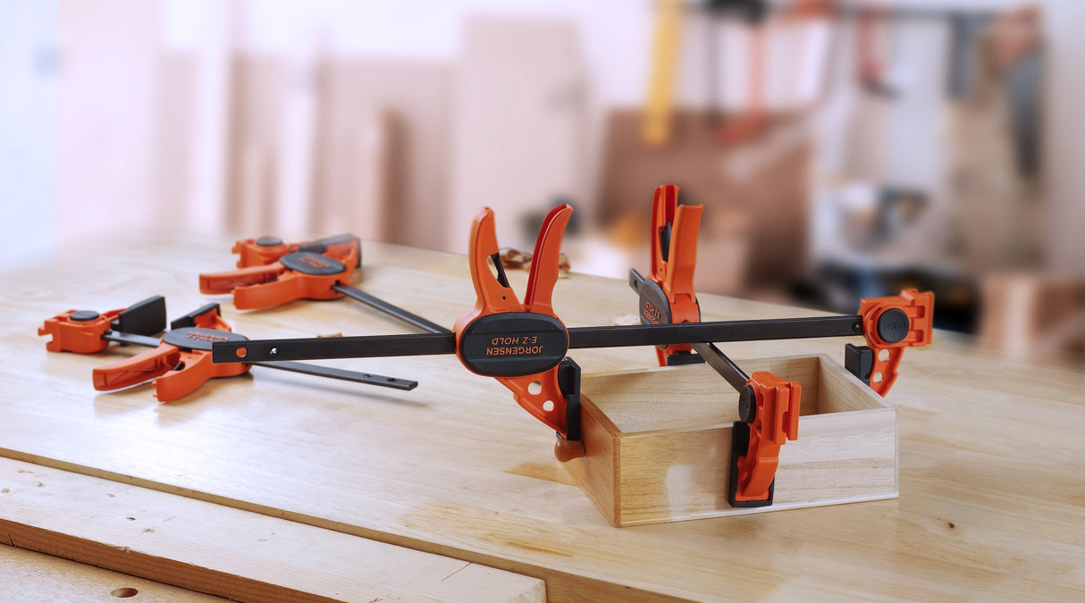 Pony Jorgensen E-Z HOLD Trigger Clamps in action, showcasing easy one-handed operation