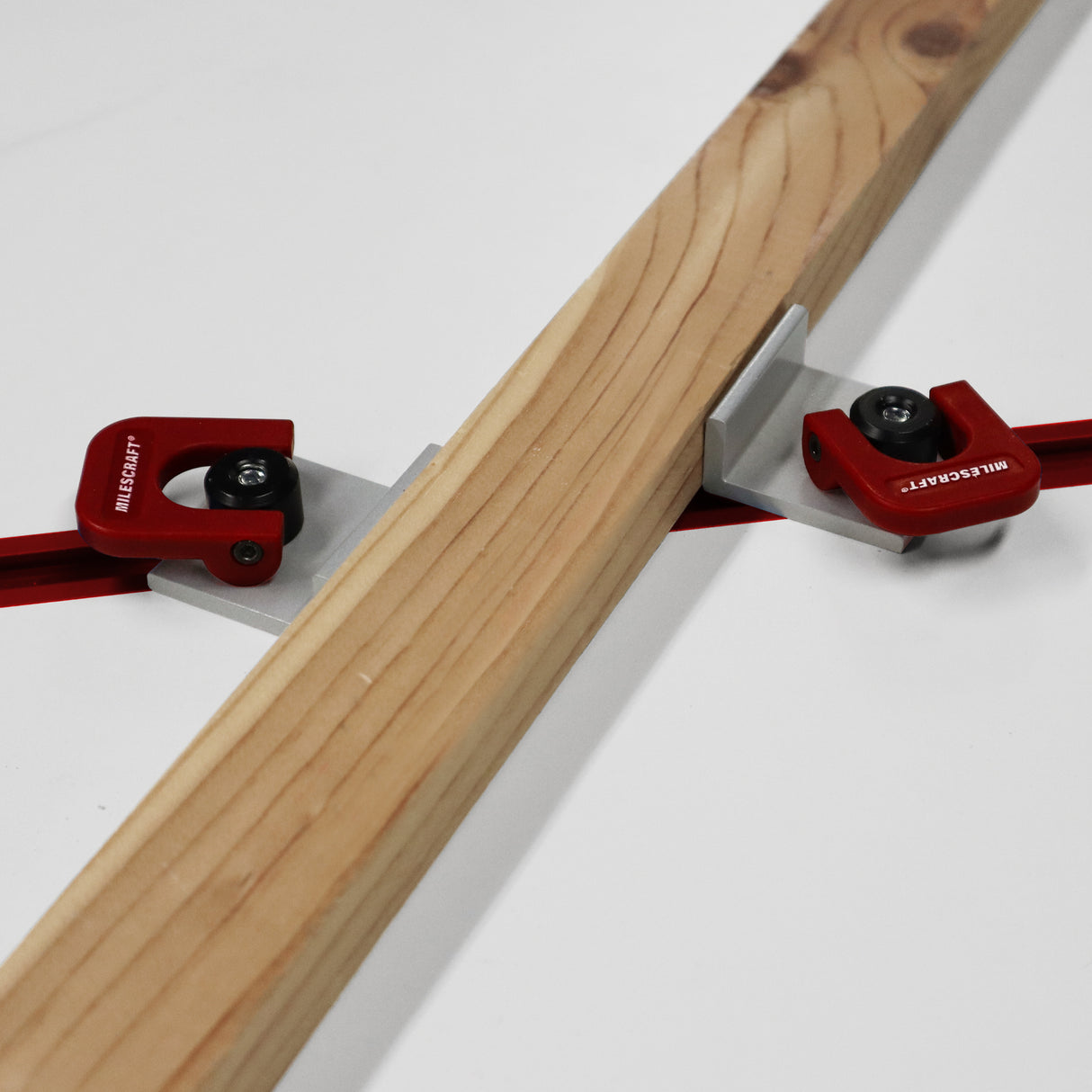 Milescraft Pack of 4 Rotatable T-Track CamStops in use with cam handles for quick adjustments