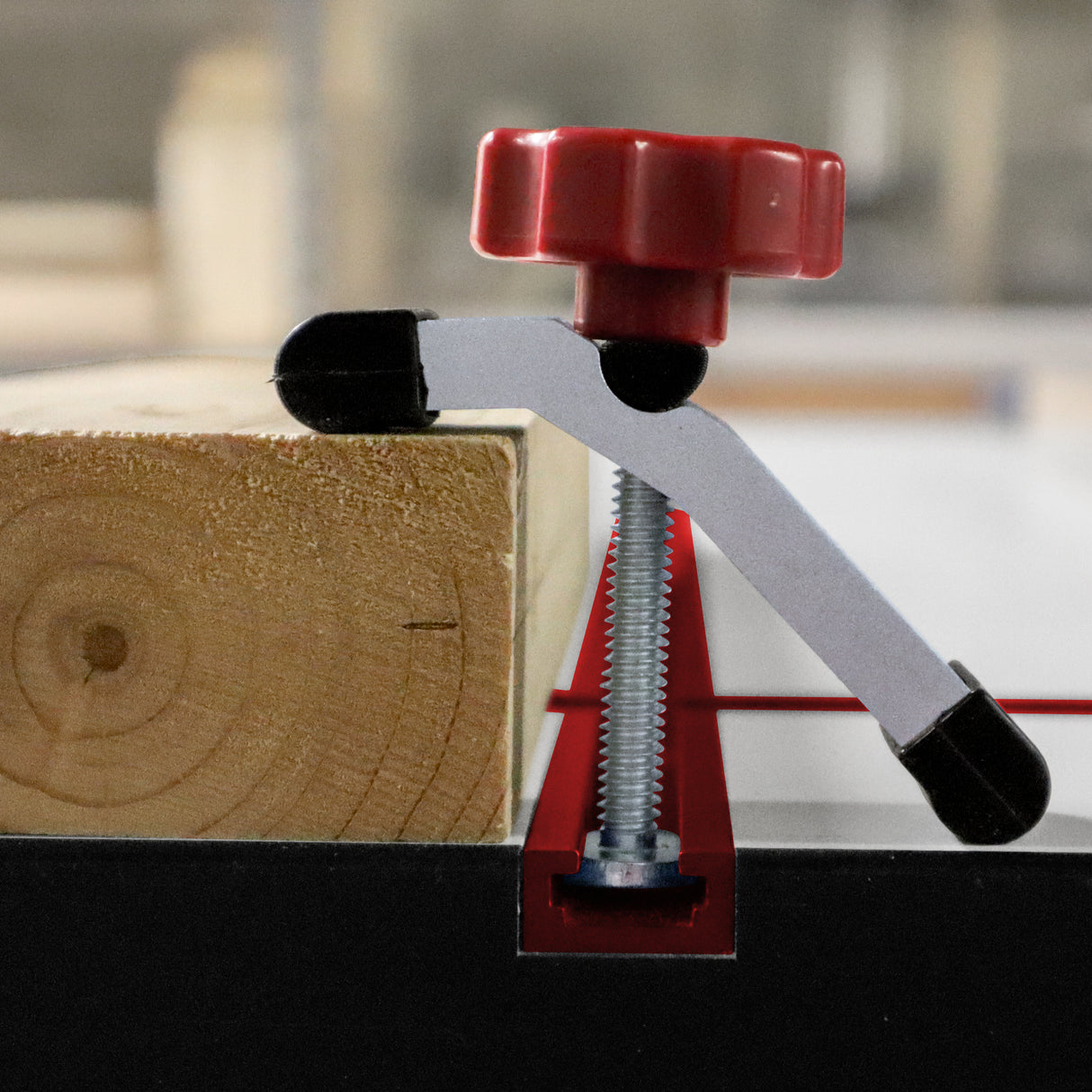 Milescraft Pack of 2 T-Track HoldDown100 Clamps with Non-Marring Rubber Tips in use on woodworking project