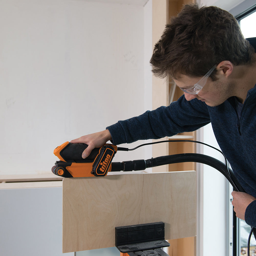 Triton TCMBS 450W Palm Belt Sander 64mm