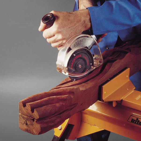 Arbortech Industrial Woodcarver Blade Set Carbide Power Carving Attachment in action on wood surface