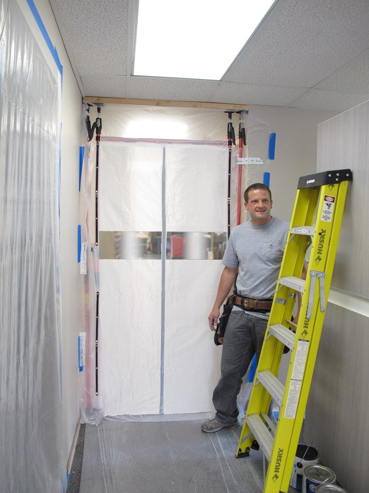 FastCap 3rd Hand Magnetic Dust Barrier Door System in use with the 3rd Hand tool