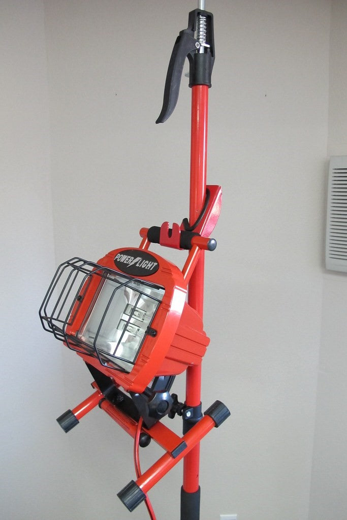 Fastcap 3rd Hand Hook & Hang accessory attached to the main pole, versatile support arm for various applications