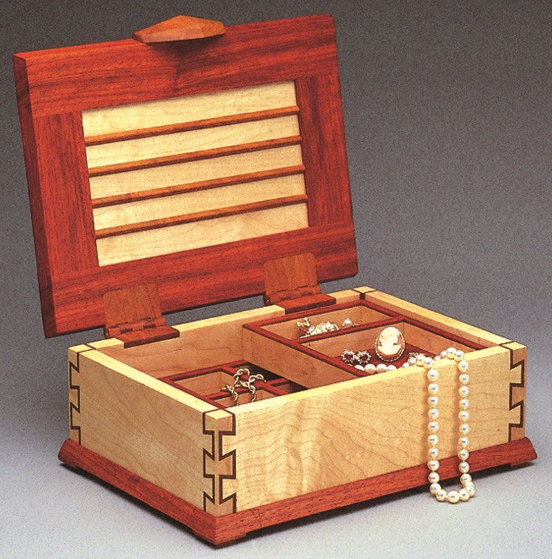 Incra Projects & Techniques Book showcasing detailed woodworking plans and techniques for LS Positioner joinery