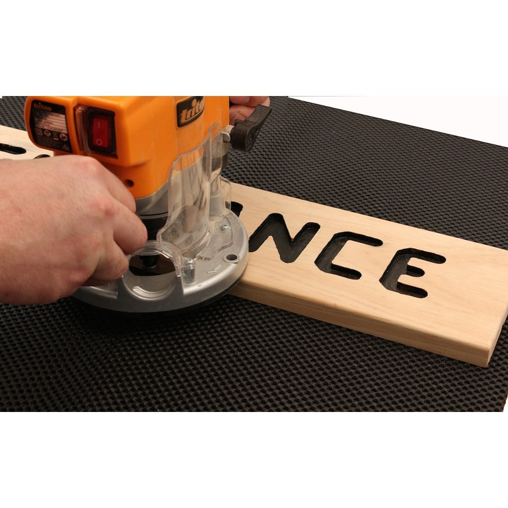 Baladonia 620 x 1220mm non-slip rubber cutting mat in use on workbench