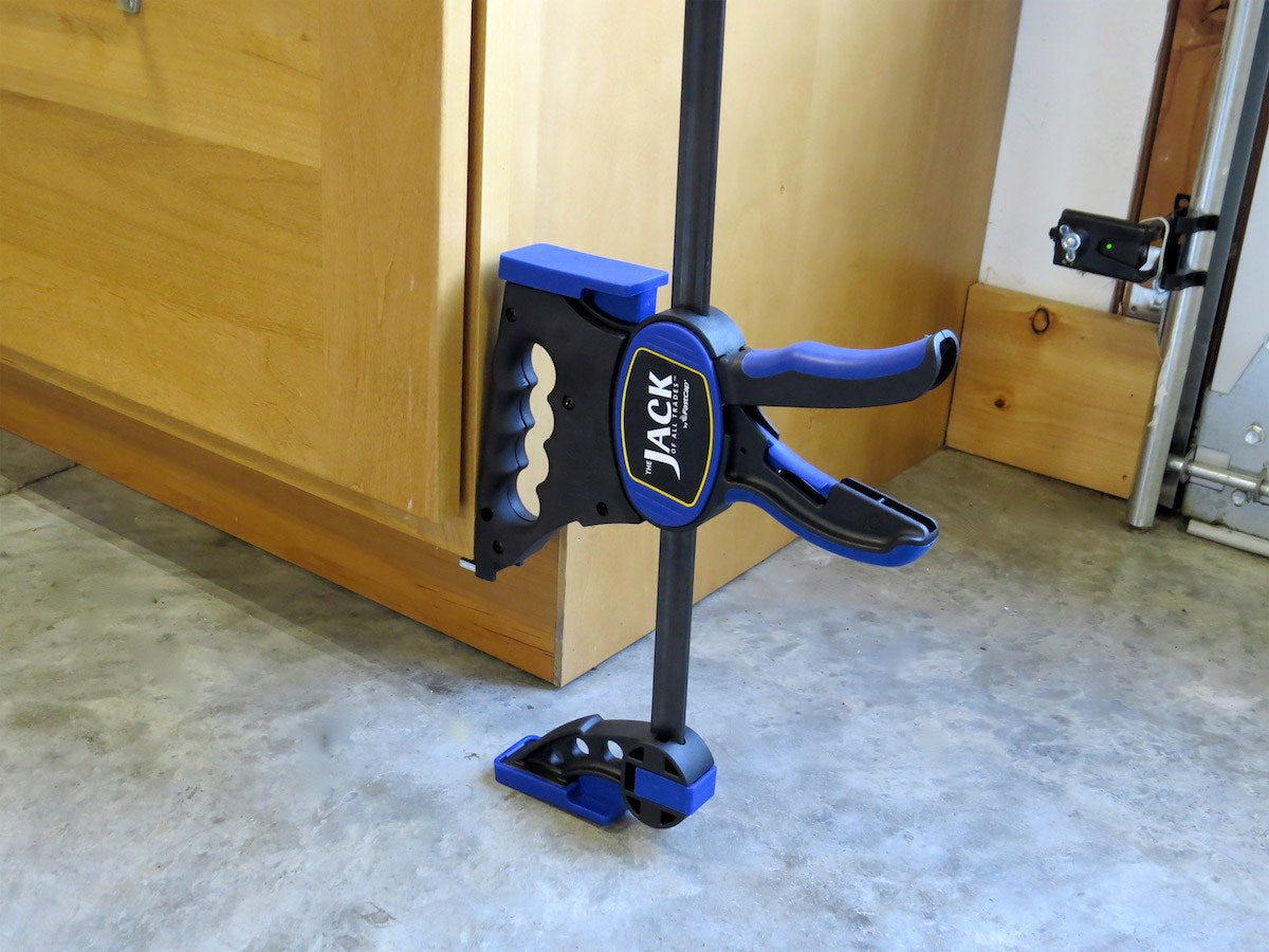 Fastcap Jack Of All Trades Reversible Trigger Clamp and Jack Lifter in action on woodworking project