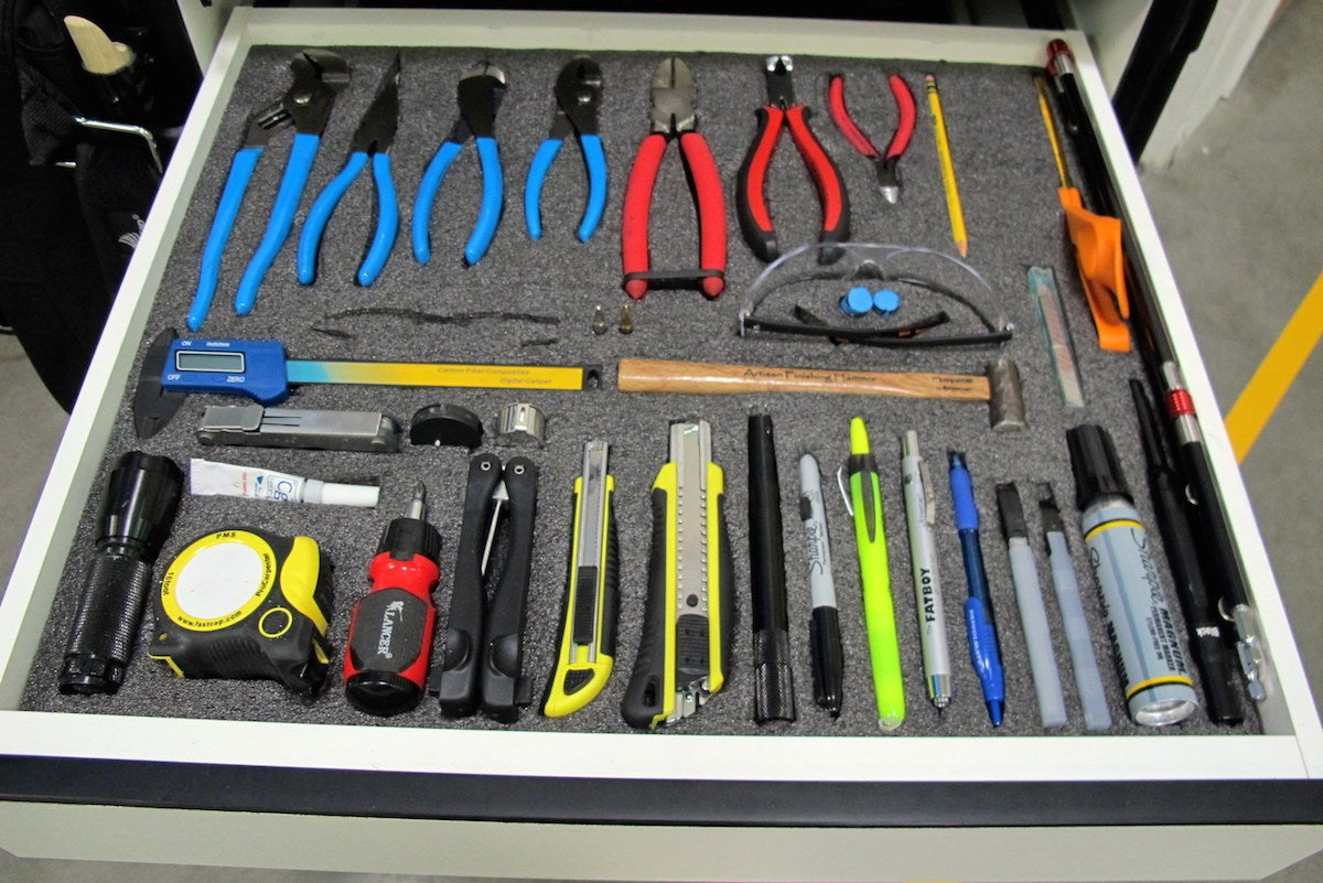 Fastcap Kaizen Foam Dark Grey 20 x 1220 x 610mm tool organizer insert in workspace