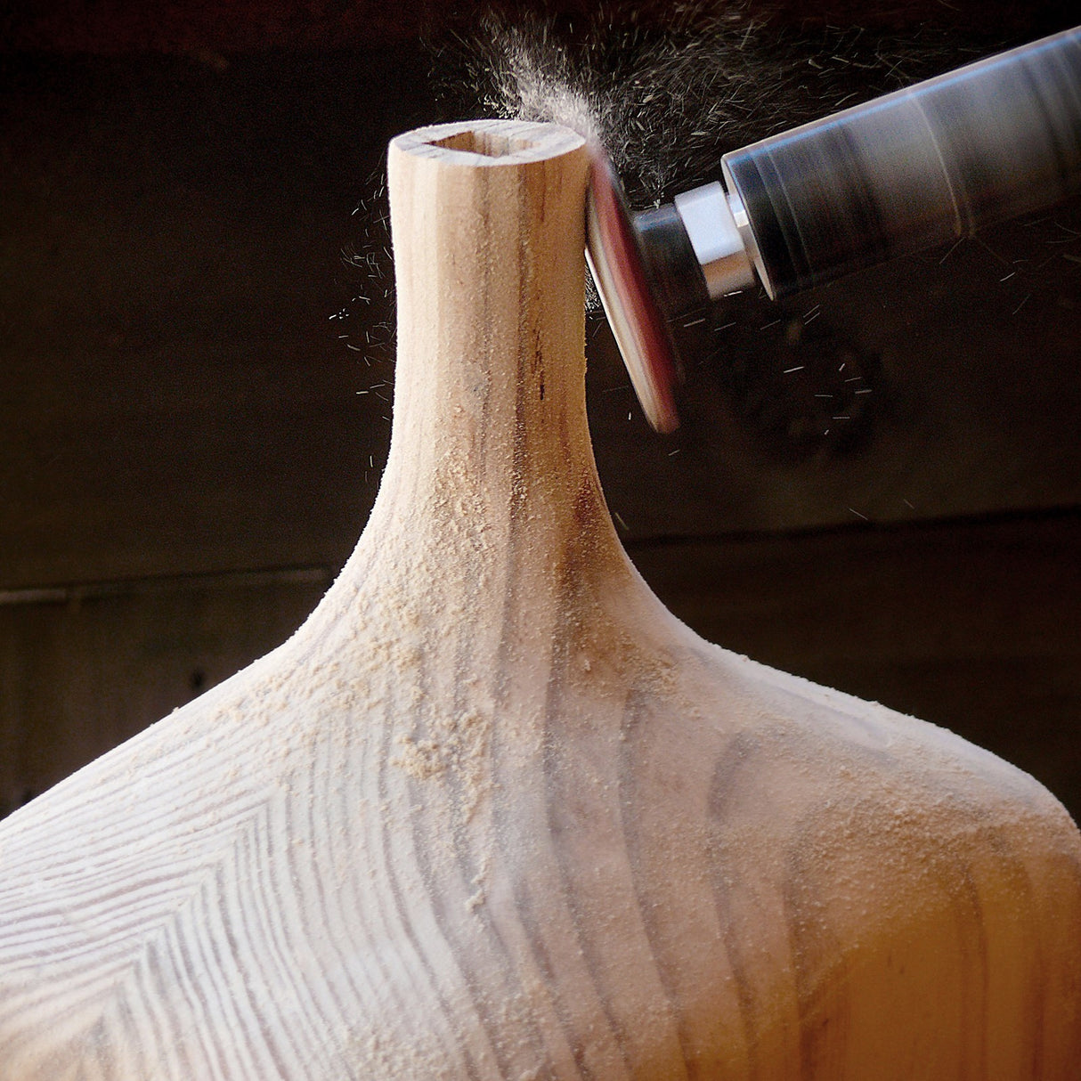 Arbortech Contour Sander Attachment in action on wood surface