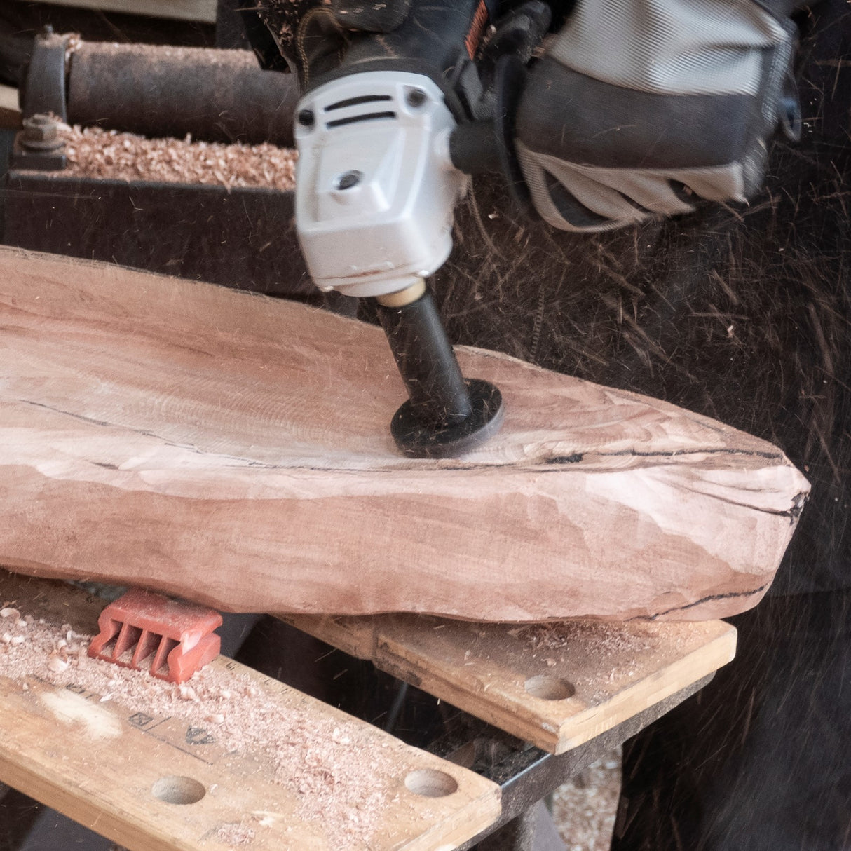 Arbortech Mini Turbo Wood Sculpting Kit in action on wood surface