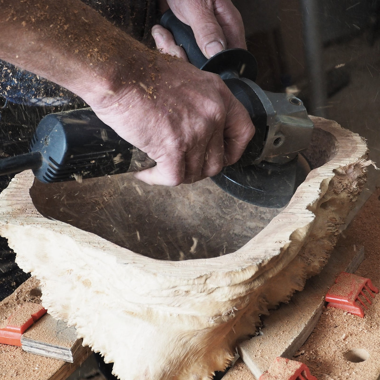 Arbortech Turbo Plane Blade creating smooth wood finish with an angle grinder