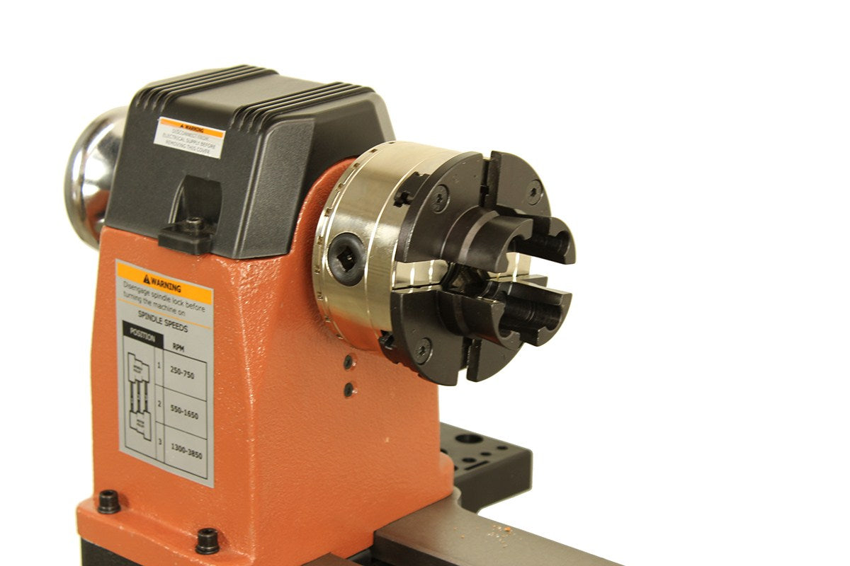 Torquata SuperGrip Jaws securely holding long workpiece for wood lathe