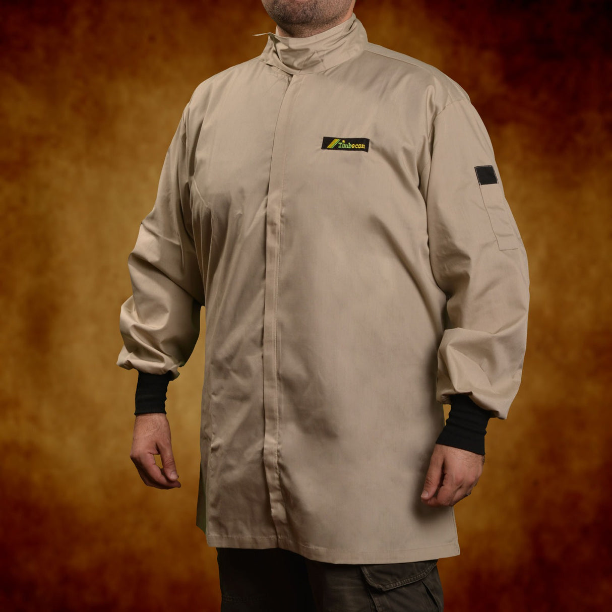 Beige full woodturners jacket in poly-cotton blend with hook-and-loop neck-band and roomy sleeves