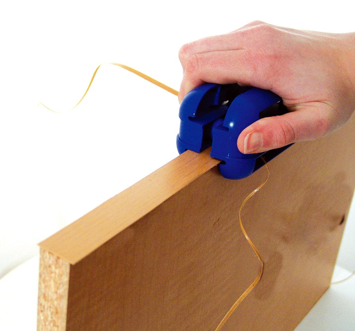 FastCap Quad Edge Trimmer with Carbon Steel Blades in action trimming edge banding efficiently