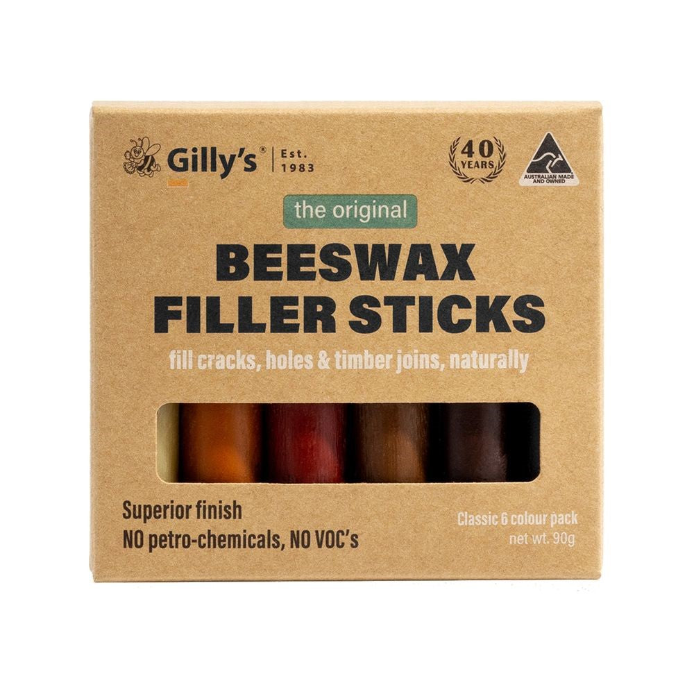 Set of 6 Beeswax Filler Sticks in various wood tones, including pale brown, orange/brown, mid brown, red/brown, dark brown and black