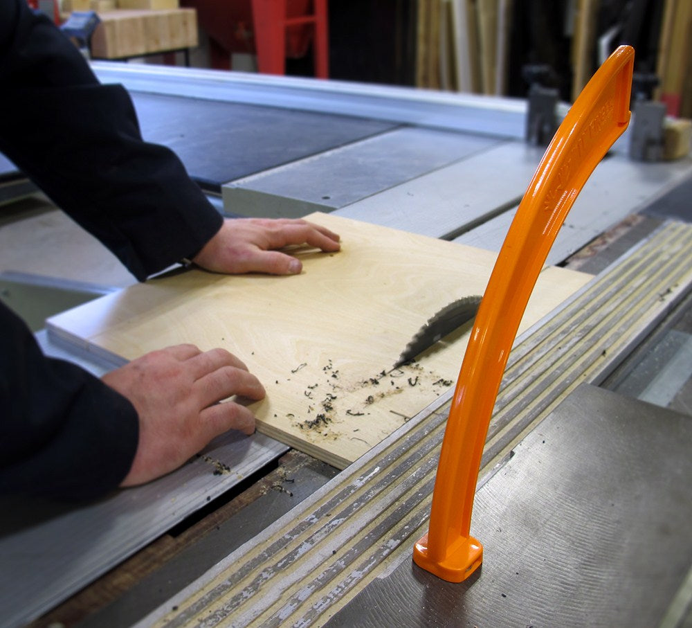 FastCap 11th Finger Magnetic Push Stick for safe woodworking, showing durable polyethylene construction and powerful neodymium magnets