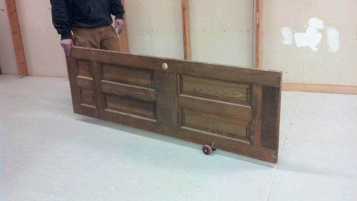 FastCap Speed Skate Mobile Dolly Mover in action with large wheels for easy movement of heavy materials