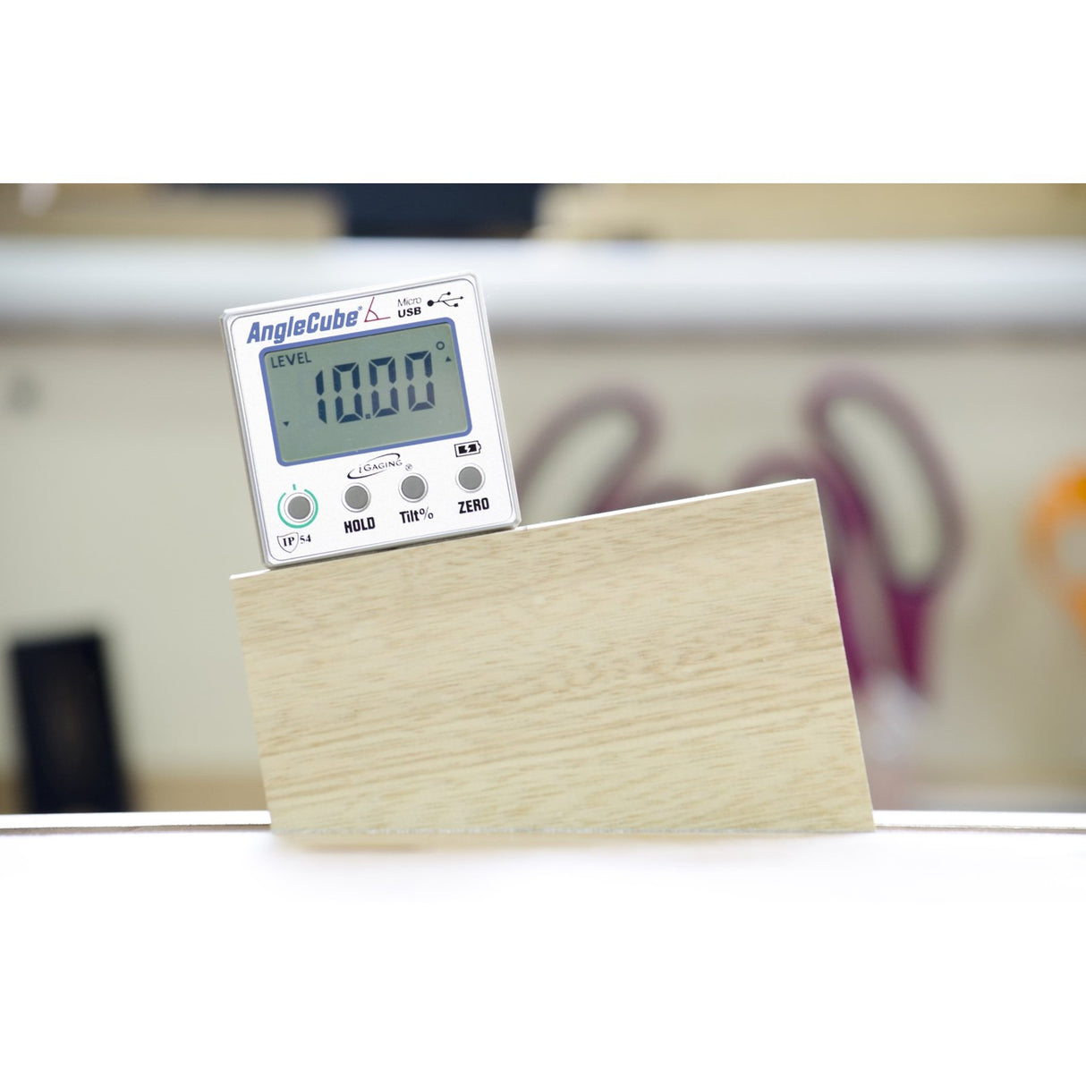 iGaging AngleCube Digital Bevel Gauge Protractor Level in action, showcasing precision design