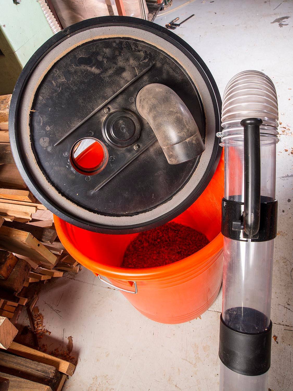 Sherwood 4in Dust Cyclone Extraction Kit - Side view of the vacuum wand attachment in action