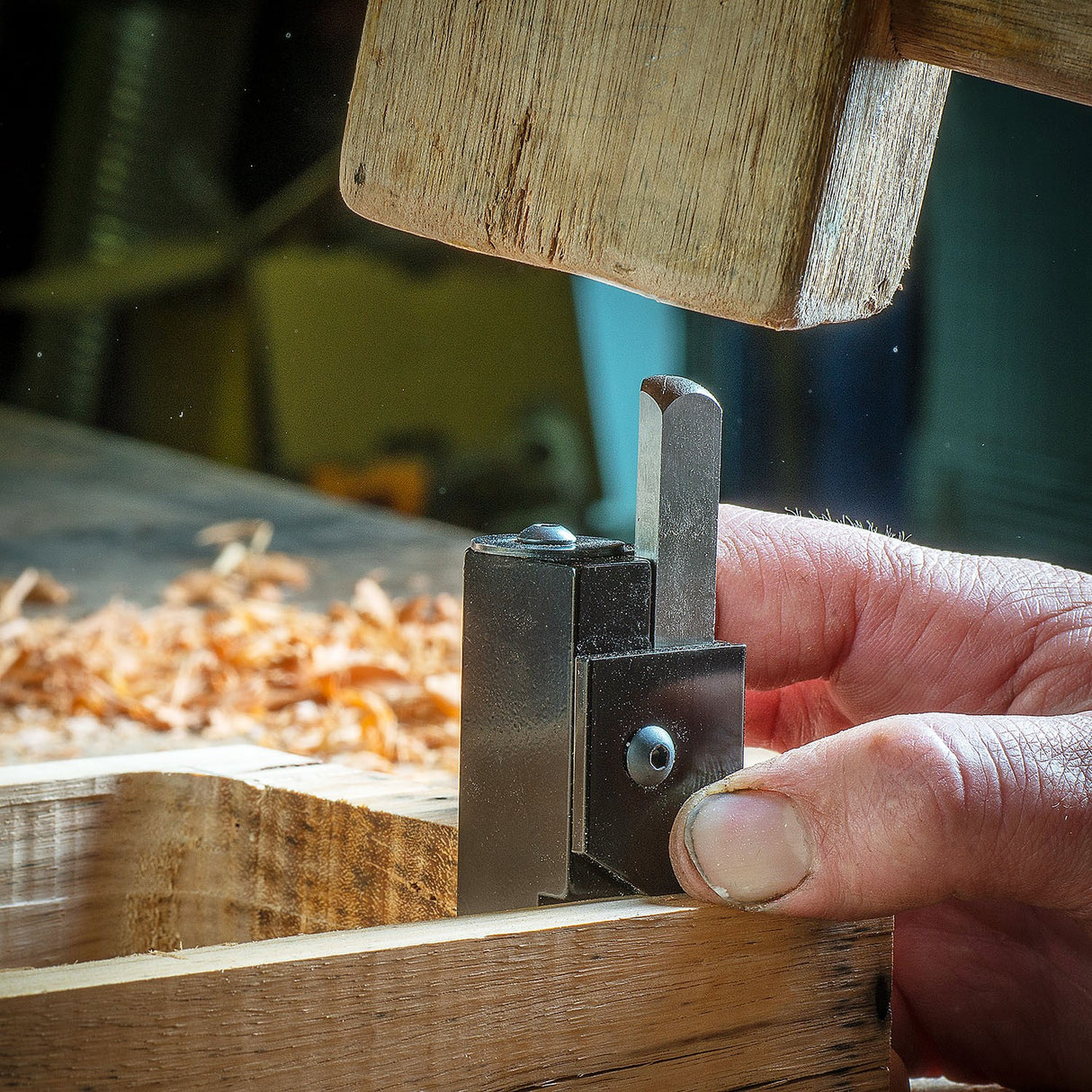 Baladonia Spring Loaded Corner Chisel tool in action, cleanly removing wood in mortice recess