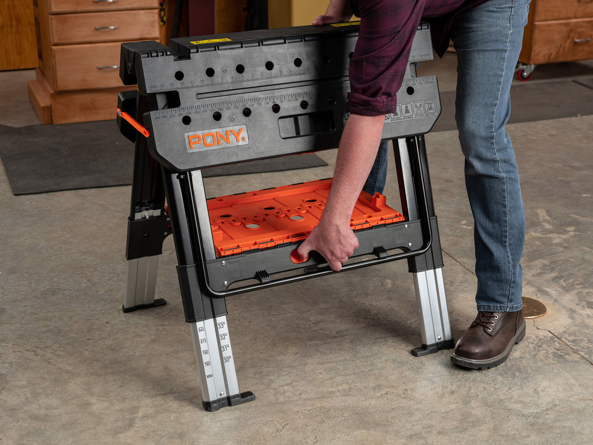 Pony Jorgensen 2-IN-1 Clamping Worktable & Sawhorse with accessories folded up for compact storage