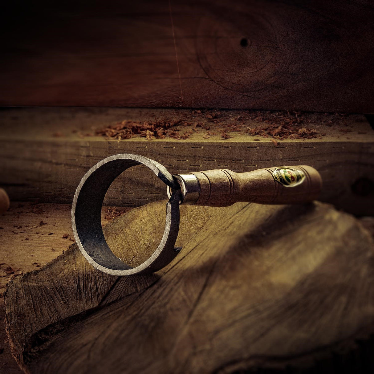 Large scorp woodworking tool with tightly curved blade and single handle for hollow carving purposes