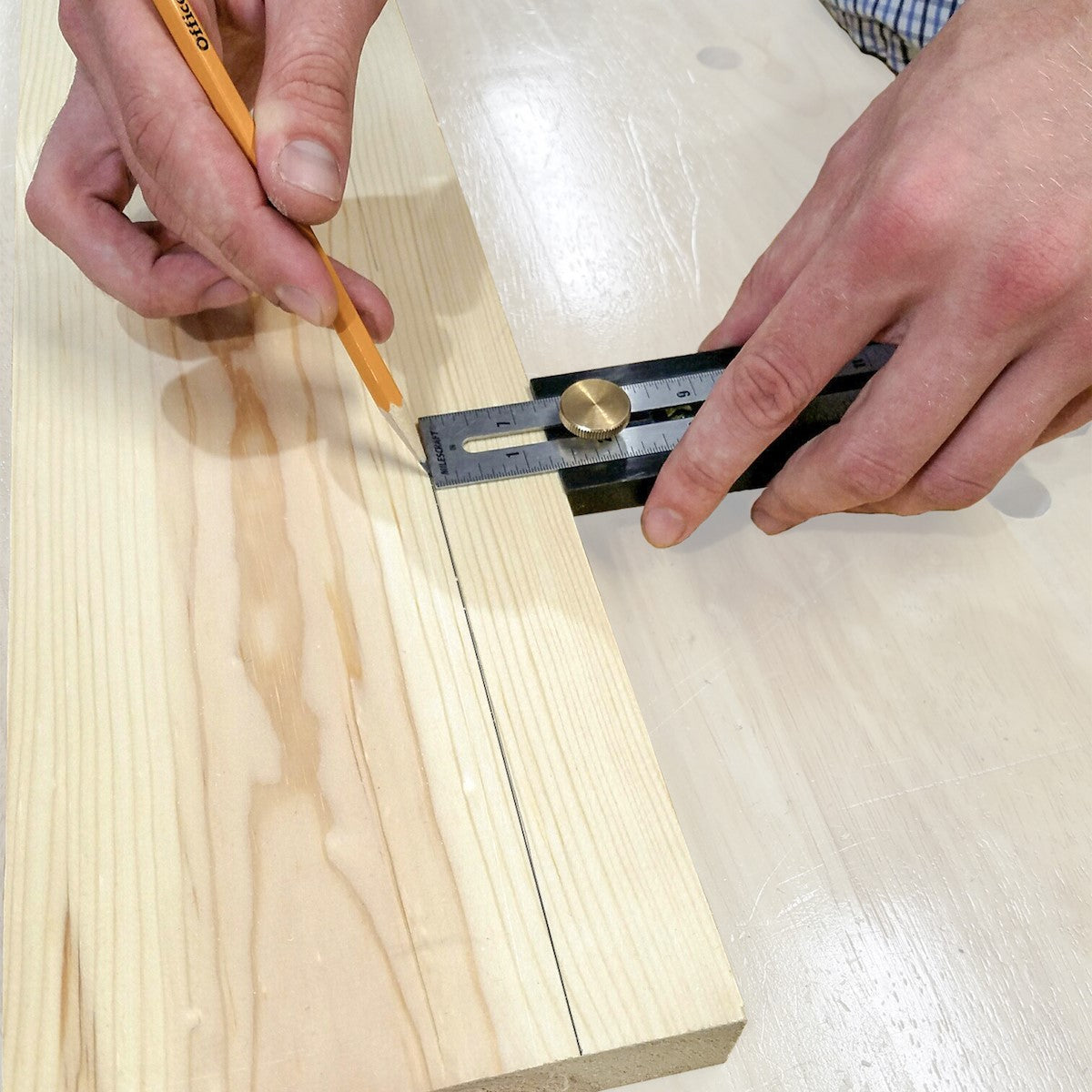 Milescraft Exactor 9-in-1 Multi-Tool showing built-in metric scale and versatility