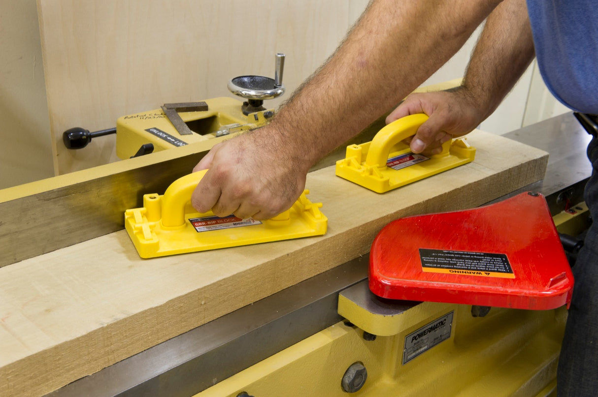 MicroJig GRR-Rip Block Smart Hook push block with Green GRR-Rip material and retractable Smart Hooks in action