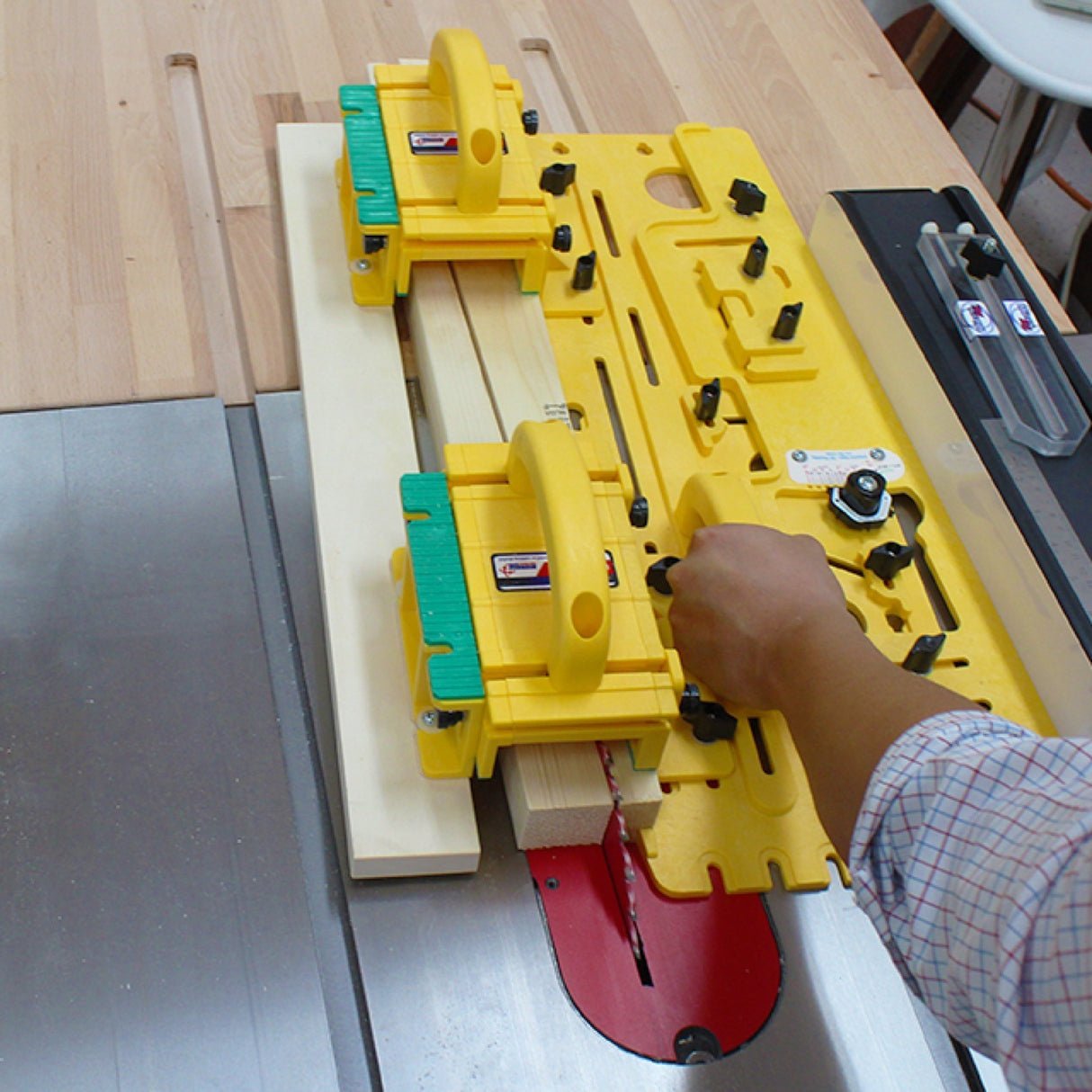 MicroJig MICRODIAL Tapering Jig angled view showcasing ColorMatch dials for precise angle adjustments on table saws