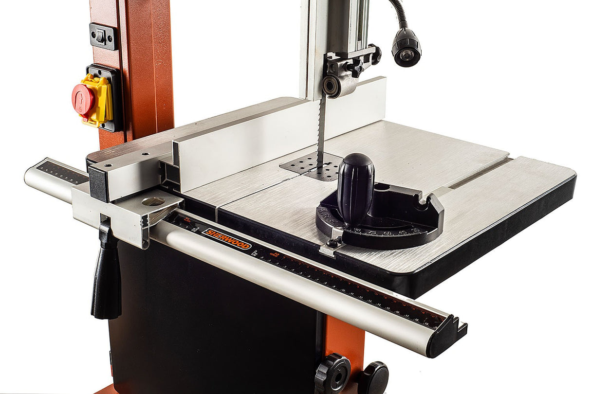 Compact Sherwood 12in 750W Bandsaw cutting wood in workshop