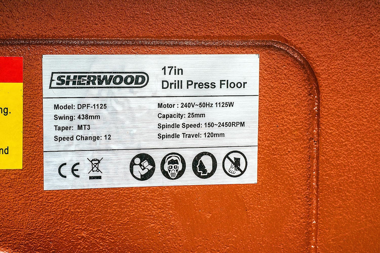 Sherwood 1125W Pedestal Drill Press in action drilling through hardwood