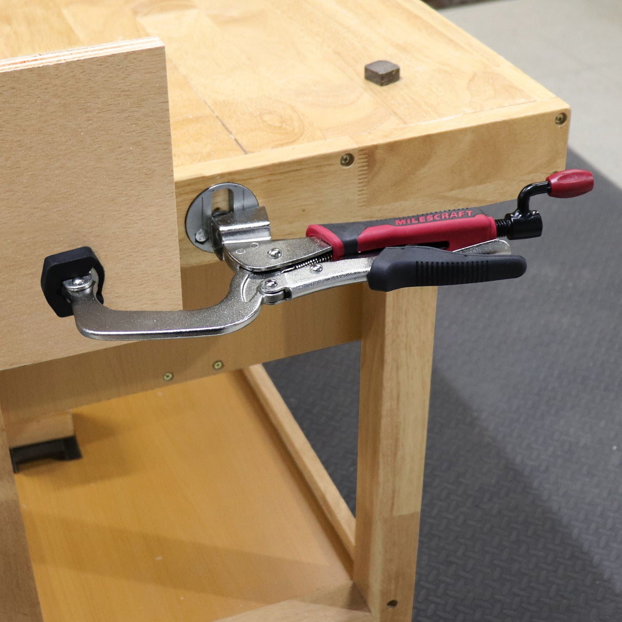 Milescraft ClampAnchors Workbench Hold Down Anchor installed on workbench with T-bolts
