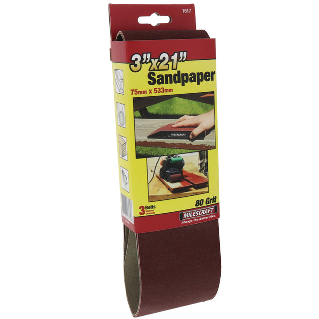 Milescraft Pack of 3 Sanding Belts 75mm x 533mm on wood surface in workshop