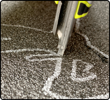 Fastcap Kaizen Knife Thin Blade Safety Cutter for Kaizen Foam in action, cutting precise contour shapes in foam