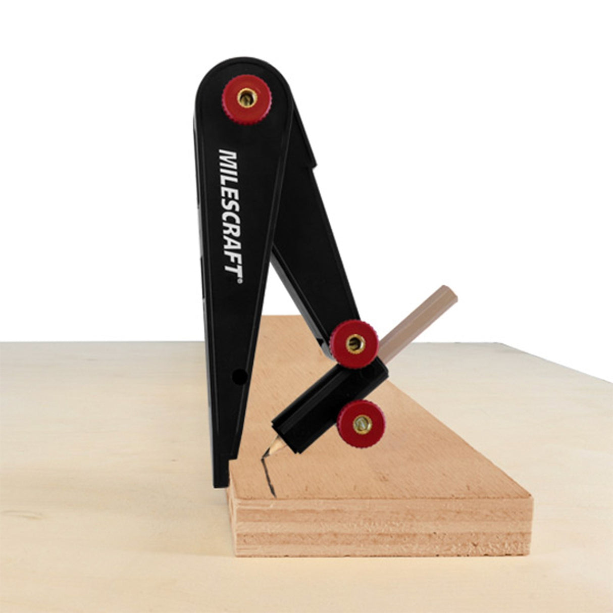 Handheld Milescraft ScribeTec scribing tool in use on wooden surface