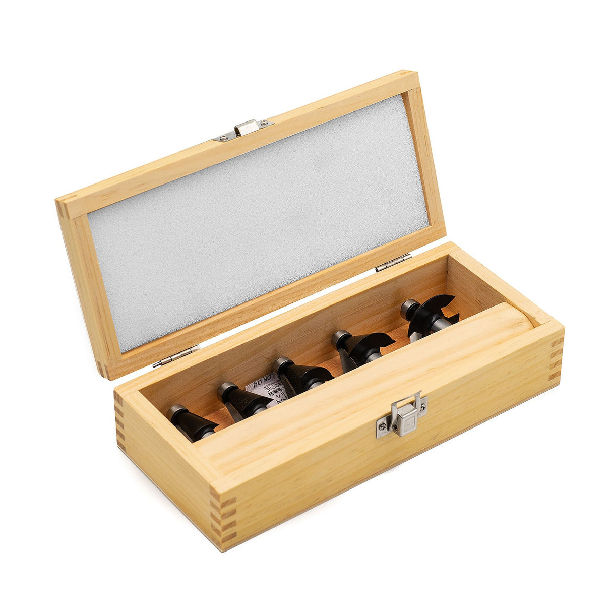 Torquata Set of 5 Chamfer Router Bits displaying various angles on wood