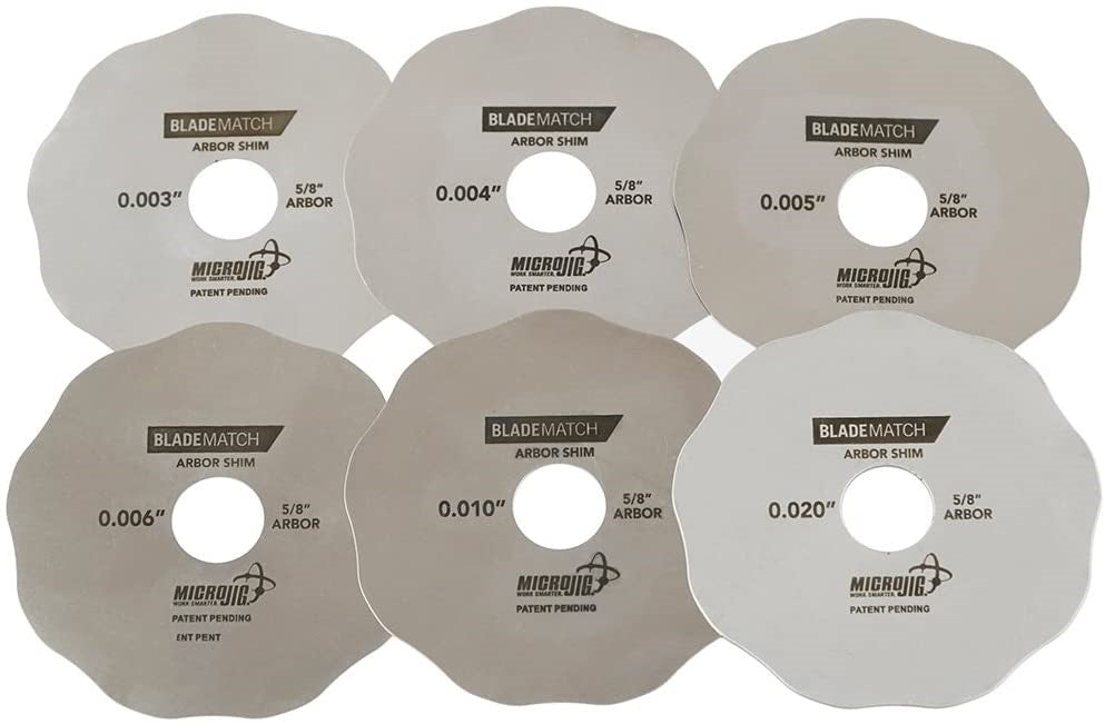 Six BLADEMATCH Arbor Shims for precise table saw alignment and improved cutting accuracy