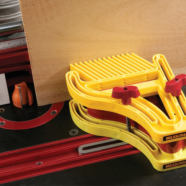 Milescraft D/T Featherboard Stacked with 5/8in & 3/4in Mitre Bars and T-slot Bolts in use on woodworking table