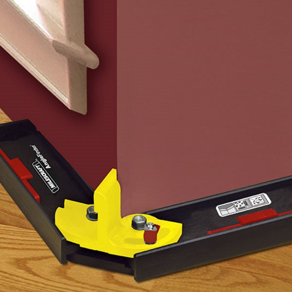 Milescraft AngleFinder with Retractable Edge Guides for precise woodworking angle measurements. Yellow angle divider for mitre saw setup